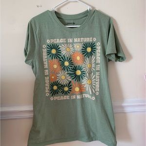green floral graphic tee